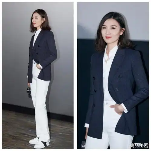 迪丽热巴一身白色西服套装,配烈焰红唇,却被眼妆抢镜了
