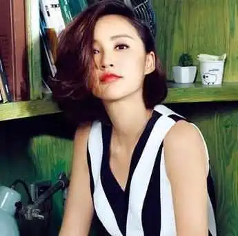 张歆艺时尚个性短发显现女人的知性美感
