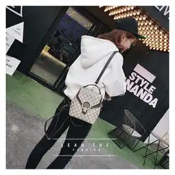 欧美经典老花女包2017新款时尚休闲双肩包印花百搭单肩斜跨水桶包yg122
