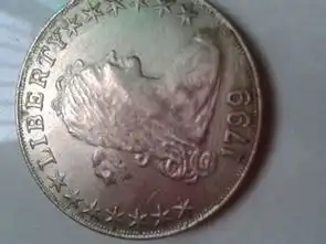 我有一个英国女王的硬币是1799年的,但是不知道它的价值是多少,是不是真的,请求专家来帮忙
