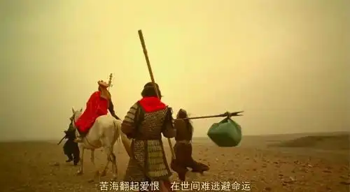 求一张大话西游里周星驰背着棍子的背影
